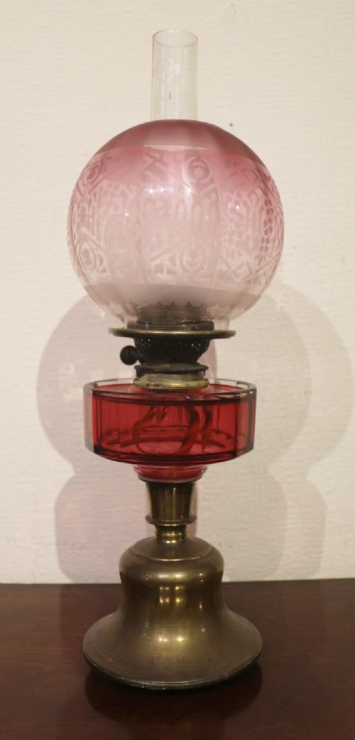 unususuall 19th century cranberry oil lamp made from 17th century arabic candlestick