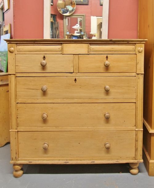 large 19th century stripped pine chest of drawers