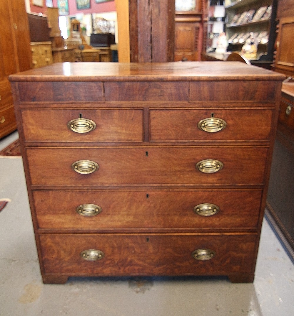 19th century oak and mahogany chest of drawers with secret drawers