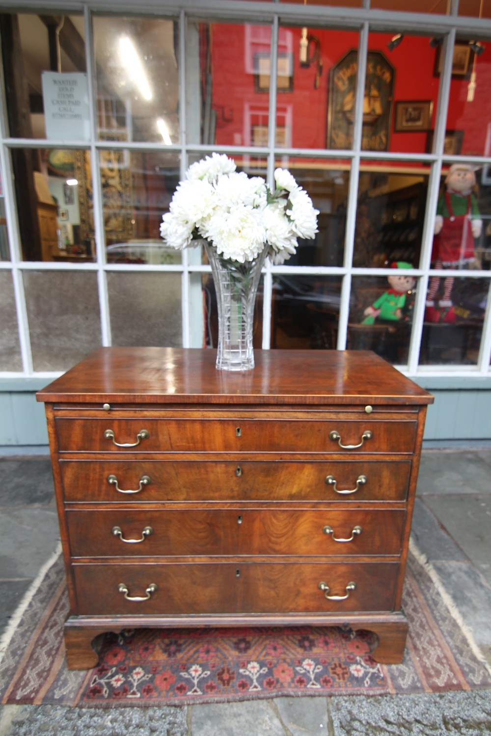 late georgian chest of drawers with brushing slide