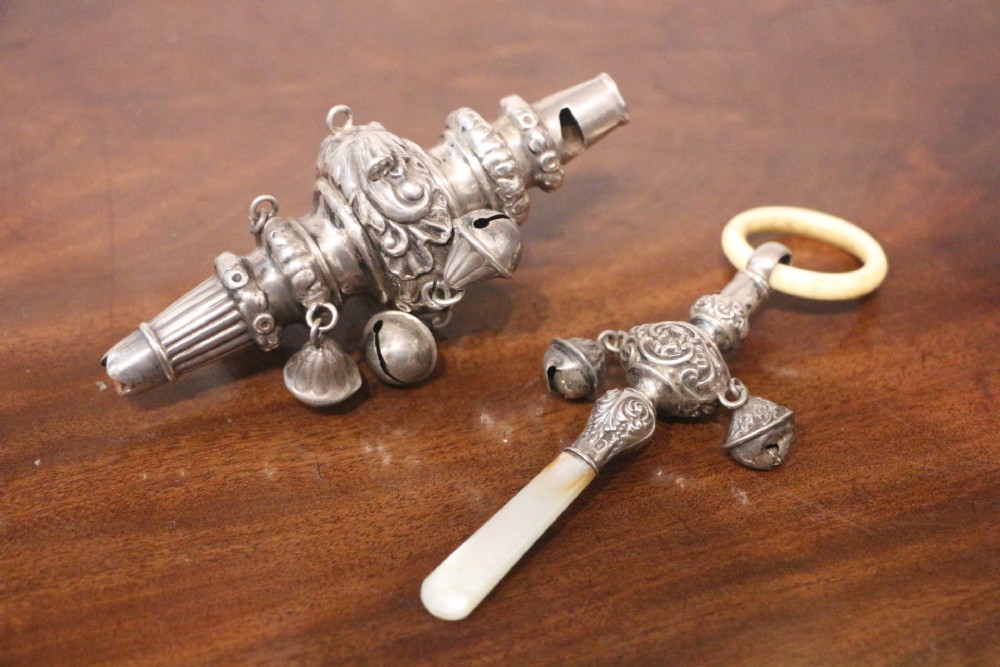 two 18th century silver childs rattles